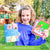 A customer photo of a blonde girl smiling and showing the What’s Going on Here Conversation Cards. She has the box in her right hand and 2 cards in her left hand, showing them to the camera. The box is blue with 4 cards on the cover. The 2 cards in her hand have red and pink borders and the top card that you can see has a large cat standing over a smaller dog who is poking a smaller animal.